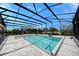 Relaxing caged pool with paver deck surrounded by lush tropical landscaping and great views at 611 San Raphael St, Kissimmee, FL 34759