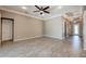 Spacious living room with recessed lighting and decorative tray ceiling detail near entryway at 611 San Raphael St, Kissimmee, FL 34759