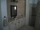 Bathroom featuring tile, vanity, and mosaic tile finishes at 2108 Northumbria Dr, Sanford, FL 32771