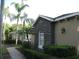 Beautiful home exterior with stone accents, manicured landscaping, and a brick pathway at 2108 Northumbria Dr, Sanford, FL 32771