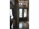 Foyer with mosaic tile accent, and decorative chandelier at 2108 Northumbria Dr, Sanford, FL 32771