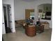 Welcoming living room with stylish decor, modern furniture, and natural light streaming through the window at 2108 Northumbria Dr, Sanford, FL 32771