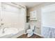 Clean bathroom with a shower-tub combo, modern sink, and updated fixtures at 250 E 20Th Ave, Mount Dora, FL 32757