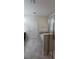 Bathroom featuring a tiled floor, soaking tub, and glass shower at 3043 Beaver Creek Dr, Kissimmee, FL 34746