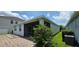 View of the home's screened-in patio at 3043 Beaver Creek Dr, Kissimmee, FL 34746