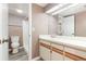 Bathroom featuring a full tub and shower, with a coordinating vanity and vinyl flooring at 4060 E Maryland Pl, Casselberry, FL 32707