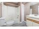 Bathroom featuring a tub and shower combination, with a coordinating vanity and vinyl flooring at 4060 E Maryland Pl, Casselberry, FL 32707