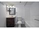 Bathroom featuring a vanity, mirror, and a combined toilet and bathtub at 5136 Park Central Dr # 212, Orlando, FL 32829