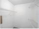 Walk-in closet with ample shelving space for organized storage solutions at 5136 Park Central Dr # 212, Orlando, FL 32829