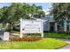 Community sign in Charles Towne featuring a convenient market store and poolside bistro at 5136 Park Central Dr # 212, Orlando, FL 32829