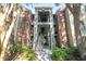 Attractive condominium building with well-maintained landscaping and inviting entrance at 5136 Park Central Dr # 212, Orlando, FL 32829