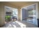 Comfortable outdoor lanai with tiled floor and serene views, perfect for relaxation at 5136 Park Central Dr # 212, Orlando, FL 32829