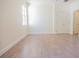 Bright bedroom features neutral walls, light-colored flooring and a double door closet at 9516 Piccadilly Sky Way, Orlando, FL 32827