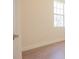 Bedroom features neutral walls, light-colored flooring and a double-hung window at 9516 Piccadilly Sky Way, Orlando, FL 32827