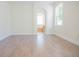 Large bedroom with natural light and views to bathroom, showing spaciousness and modern design at 9516 Piccadilly Sky Way, Orlando, FL 32827