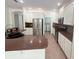 Gourmet kitchen boasts sleek stainless steel appliances and stylish countertop finishes at 9516 Piccadilly Sky Way, Orlando, FL 32827
