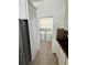 Convenient laundry room adjacent to kitchen equipped with new washer and dryer at 9516 Piccadilly Sky Way, Orlando, FL 32827