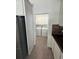 Laundry room featuring a washer and dryer with white cabinets at 9516 Piccadilly Sky Way, Orlando, FL 32827