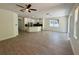 Open-concept living room showcases modern finishes and abundant natural light at 9516 Piccadilly Sky Way, Orlando, FL 32827