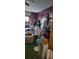 A bedroom filled with personal belongings and furniture needing organizing at 1066 Geneva Dr, Oviedo, FL 32765