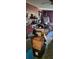 A bedroom filled with personal belongings and furniture needing organizing at 1066 Geneva Dr, Oviedo, FL 32765