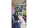 Cozy front porch with comfortable seating and tranquil garden view at 1066 Geneva Dr, Oviedo, FL 32765