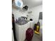 Functional laundry room with modern appliances and storage at 1119 Park Ridge Cir, Kissimmee, FL 34746