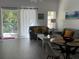 Inviting living room filled with natural light from a sliding door to the patio at 1119 Park Ridge Cir, Kissimmee, FL 34746