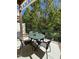 Outdoor patio area with table and chairs, perfect for relaxing and enjoying the scenery at 1119 Park Ridge Cir, Kissimmee, FL 34746