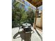 Outdoor patio area with table and chairs, perfect for relaxing and enjoying the scenery at 1119 Park Ridge Cir, Kissimmee, FL 34746