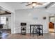 Bright kitchen area with modern appliances, wooden ceiling fan, and neutral decor at 112 E Coleman Cir, Sanford, FL 32773