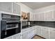 Kitchen featuring black appliances, updated cabinets, with plenty of counter space at 112 E Coleman Cir, Sanford, FL 32773