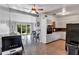Open-concept living space showcasing a kitchen and dining area with seamless flow at 112 E Coleman Cir, Sanford, FL 32773