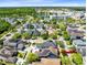 Discover a neighborhood with tree-lined streets and well-maintained homes, some featuring solar panels on their roofs at 13034 Royal Fern Dr, Orlando, FL 32828