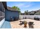 Spacious brick-paved backyard featuring furniture and outdoor grill, great for entertaining at 13034 Royal Fern Dr, Orlando, FL 32828