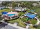 Aerial view of a well-equipped playground with colorful structures, perfect for Gathering fun and outdoor activities at 13034 Royal Fern Dr, Orlando, FL 32828