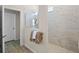 Walk-in shower featuring stylish tile work, glass enclosure, and modern fixtures at 13133 Sunny Retreat Ln, Winter Garden, FL 34787