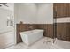 Modern bathroom with a freestanding soaking tub and a standing shower at 1316 Lake Baldwin Ln, Orlando, FL 32814