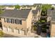 Rows of two-story townhomes featuring black shutters and two car garages at 1316 Lake Baldwin Ln, Orlando, FL 32814