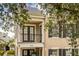 Charming two-story townhome featuring black shutters and a balcony at 1316 Lake Baldwin Ln, Orlando, FL 32814