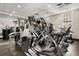 Community gym offering various cardio and strength training equipment and ample natural light at 1316 Lake Baldwin Ln, Orlando, FL 32814