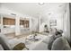 Bright and airy living room open to kitchen and dining area with modern furnishings at 1316 Lake Baldwin Ln, Orlando, FL 32814