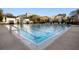 Community pool with marked lanes, clear blue water, and lounge chairs on the pool deck at 1316 Lake Baldwin Ln, Orlando, FL 32814