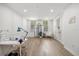 Bright salon space with manicure desk, stylish decor, hardwood floors, and natural light at 1316 Lake Baldwin Ln, Orlando, FL 32814