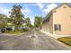 Street view of a multi-unit building complex with parking and mature trees lining the street at 1316 Lake Baldwin Ln, Orlando, FL 32814