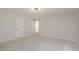 Spacious bedroom with neutral carpet, walk in closet and plenty of natural light at 14433 Huntingfield Dr, Orlando, FL 32824