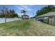 Large grassy backyard, ideal for outdoor activities at 1448 Lambert St, Deltona, FL 32725