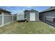 Well-maintained backyard featuring a storage shed, and trailer parking at 1448 Lambert St, Deltona, FL 32725