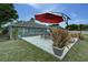 Backyard patio and seating area at 1448 Lambert St, Deltona, FL 32725