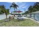 Large backyard with a patio area, perfect for outdoor entertaining at 1448 Lambert St, Deltona, FL 32725